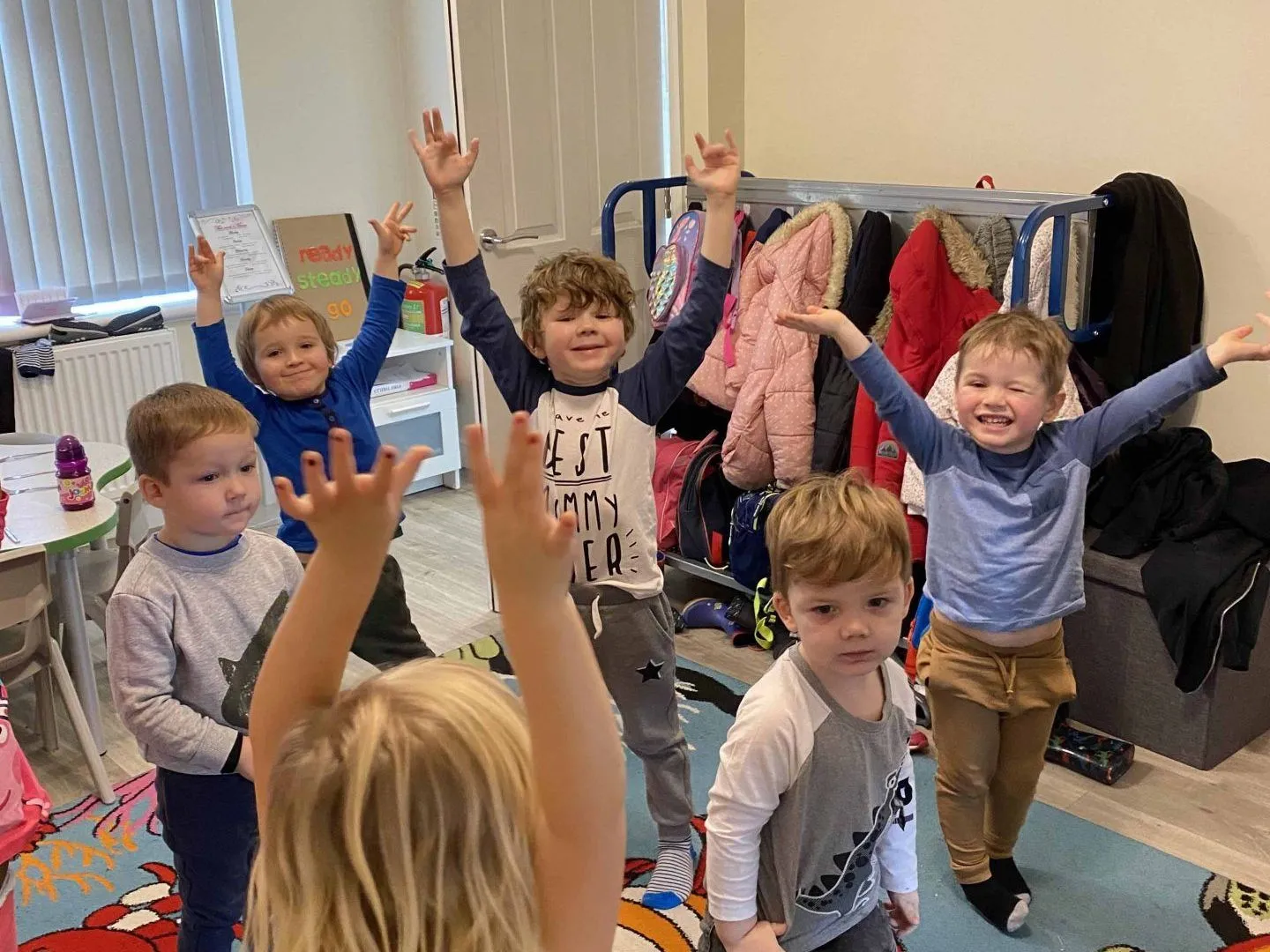 Children dancing with ribbons in the nursery at Ready Steady Go Childcare Worle